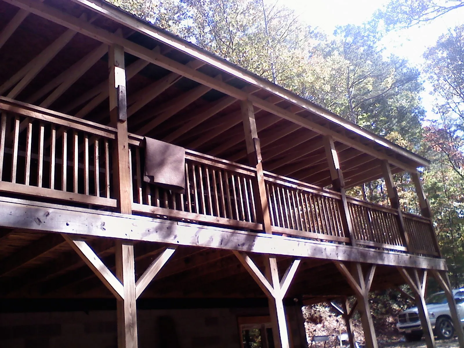 Timber framing under a new elevated porch and deck — Roof Leak Repair in Greenbelt by Roofing Brothers
